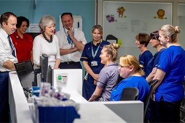 Theresa May unveils 10-year NHS reform plans despite Treasury opposition