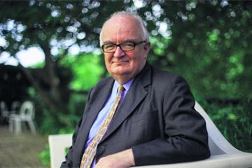 Public bodies should pay board members, commissioner says