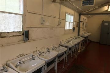 Immigration watchdog sets out inspection plan as report calls barracks asylum housing 'dispiriting' and 'dirty'