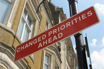 'Miles away from conveying the necessary radicalism': Priority outcomes one year on