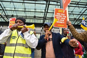 Outsourced staff at three departments begin strike action